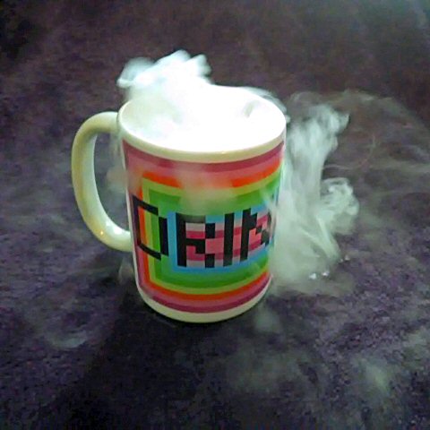 Picture of Drinking Mug, with Carbon Dioxide spilling from the top.